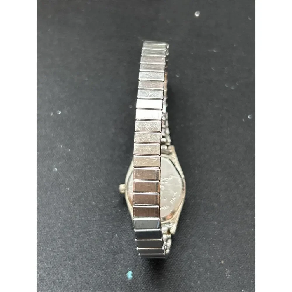Sharp Silver Tone White Dial Stretch Band Women’s Quartz Watch